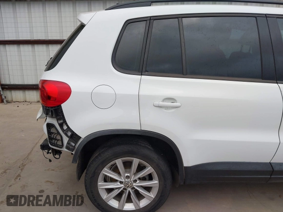 2015 Volkswagen Tiguan R-Line with VIN WVGAV7AX5FW585248, listed as a IAAI auction lot 41909618 with 137,448 mi miles and . Bid and sale history available at DreamBid. Image 18.