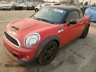 2012 MINI Coupe S z VIN WMWSX3C57CT155013, wystawiony jako Copart lot #88066275 z przebiegiem 69 870 mil mil oraz Szkody całkowita. Historia ofert i sprzedaży dostępna na DreamBid. Obrazek 1.