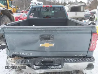 2014 Chevrolet Silverado 1500 LT with VIN 1GCVKREC0EZ291142, listed as a IAAI auction lot 41288155 with 112,384 mi miles and . Bid and sale history available at DreamBid. Image 15.
