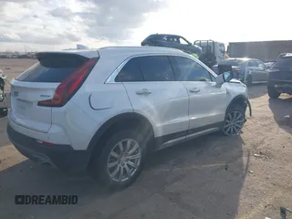 2021 Cadillac XT4 FWD Premium Luxury with VIN 1GYFZCR47MF084998, listed as a IAAI auction lot 41483283 with 1 mi miles. Bid and sale history available at carsss.com. Image 4.