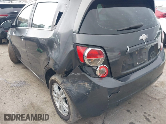 2016 Chevrolet Sonic LT z VIN 1G1JC6SH3G4155865, wystawiony jako IAAI lot #41808426 z przebiegiem 142 866 mil mil oraz . Historia ofert i sprzedaży dostępna na DreamBid. Obrazek 6.