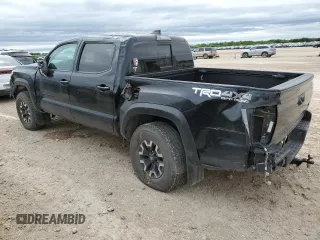 2021 Toyota Tacoma SR z VIN 5TFCZ5AN1MX256607, wystawiony jako Copart lot #52182225 z przebiegiem 44 717 mil mil oraz Szkoda całkowita • Salvage title. Historia ofert i sprzedaży dostępna na DreamBid. Obrazek 2.