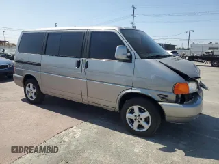 1999 Volkswagen EuroVan GLS с VIN WV2KH2705XH017697, выставлен на аукционе Copart как лот 69303664 с пробегом 156 811 миль миль и Списание • Salvage title. История ставок и продаж доступна на DreamBid. Изображение 4.