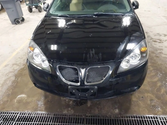 2006 Pontiac G6 6-Cyl with VIN 1G2ZG558764275630, listed as a IAAI auction lot 41446766 with NaN miles. Bid and sale history available at carsss.com. Image 6.
