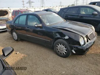 2000 Mercedes-Benz E-Class with VIN WDBJF82J4YX042051, listed as a Copart auction lot 72147904 with 265,886 mi miles and Salvage Title. Bid and sale history available at carsss.com. Image 4.