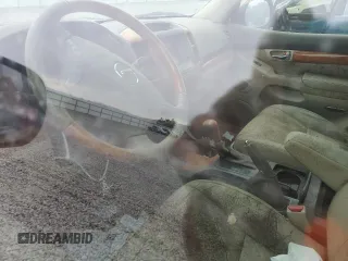 2004 Lexus GX 470 z VIN JTJBT20X740034416, wystawiony jako Copart lot #50888295 z przebiegiem Nie podano mil oraz Szkoda całkowita • Salvage title. Historia ofert i sprzedaży dostępna na DreamBid. Obrazek 8.