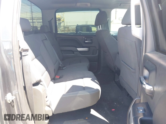 2018 Chevrolet Silverado 1500 LT with VIN 3GCUKREC1JG511846, listed as a IAAI auction lot 42024170 with 121,532 mi miles and . Bid and sale history available at DreamBid. Image 8.