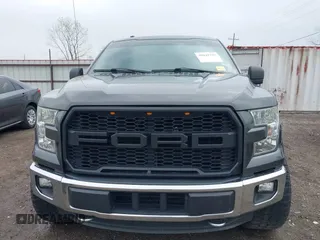 2015 Ford F-150 XLT with VIN 1FTEX1EP9FFC75210, listed as a IAAI auction lot 39041797 with 125,522 mi miles. Bid and sale history available at carsss.com. Image 13.