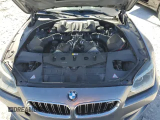 2014 BMW M6 z VIN WBS6C9C54ED467184, wystawiony jako Copart lot #80580904 z przebiegiem 88 878 mil mil oraz Czysty tytuł • Clean title. Historia ofert i sprzedaży dostępna na DreamBid. Obrazek 11.