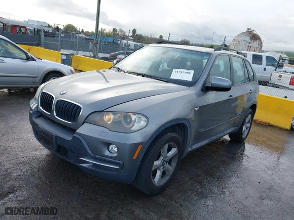 2007 BMW X5 3.0si with VIN 5UXFE43517LY81728, listed as a IAAI auction lot 41787988 with 82,999 mi miles. Bid and sale history available at carsss.com. Image 2.