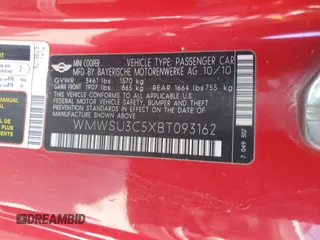 2011 MINI Hardtop z VIN WMWSU3C5XBT093162, wystawiony jako Copart lot #54871315 z przebiegiem 171 220 mil mil oraz Szkody całkowita. Historia ofert i sprzedaży dostępna na DreamBid. Obrazek 12.