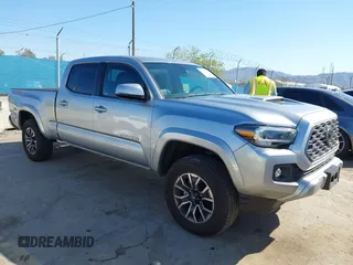 2023 Toyota Tacoma SR5 z VIN 3TMDZ5BN3PM163312, wystawiony jako IAAI lot #41831424 z przebiegiem 27 486 mil mil oraz . Historia ofert i sprzedaży dostępna na DreamBid. Obrazek 1.