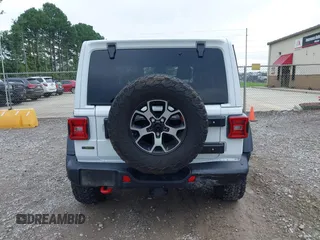 2021 Jeep Wrangler Unlimited Rubicon with VIN 1C4JJXFM9MW774142, listed as a IAAI auction lot 42625007 with 42,318 mi miles and . Bid and sale history available at DreamBid. Image 16.