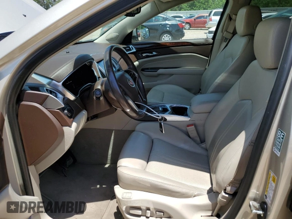 2015 Cadillac SRX Luxury Collection z VIN 3GYFNBE31FS637758, wystawiony jako Copart lot #56911815 z przebiegiem 73 893 mil mil oraz Czysty tytuł • Clean title. Historia ofert i sprzedaży dostępna na DreamBid. Obrazek 7.