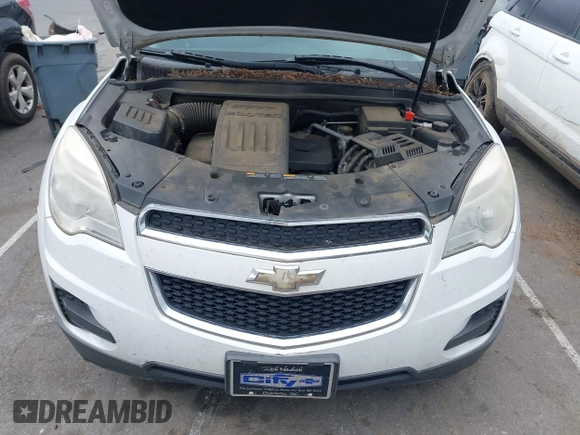 2015 Chevrolet Equinox LT z VIN 2GNALBEK6F6140899, wystawiony jako IAAI lot #42288349 z przebiegiem 149 369 mil mil oraz . Historia ofert i sprzedaży dostępna na DreamBid. Obrazek 10.