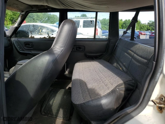 2001 Jeep Cherokee Sport with VIN 1J4FF48S21L608893, listed as a Copart auction lot 61865484 with 172,440 mi miles and Non Repairable. Bid and sale history available at carsss.com. Image 10.