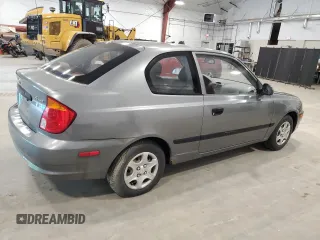 2004 Hyundai Accent z VIN KMHCF35C14U310393, wystawiony jako Copart lot #57840235 z przebiegiem 50 825 mil mil oraz Tytuł czysty. Historia ofert i sprzedaży dostępna na DreamBid. Obrazek 3.