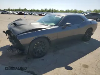 2019 Dodge Challenger R/T z VIN 2C3CDZBT4KH540452, wystawiony jako Copart lot #55889325 z przebiegiem 33 896 mil mil oraz Szkoda całkowita • Salvage title. Historia ofert i sprzedaży dostępna na DreamBid. Obrazek 1.