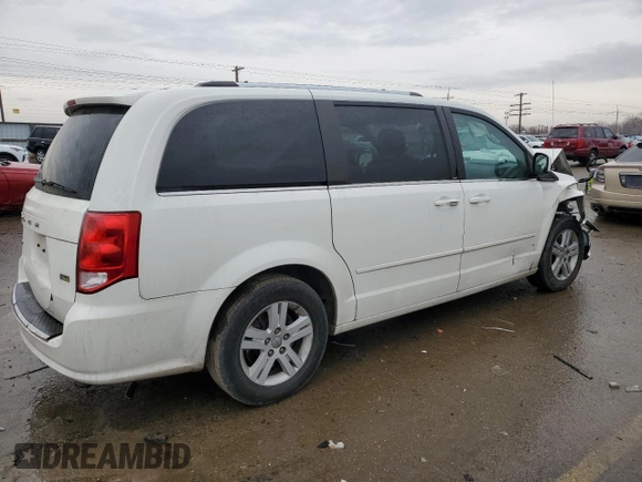 2013 Dodge Grand Caravan Crew with VIN 2C4RDGDG5DR740098, listed as a Copart auction lot 84491644 with 146,400 mi miles and Salvage Title. Bid and sale history available at DreamBid. Image 3.