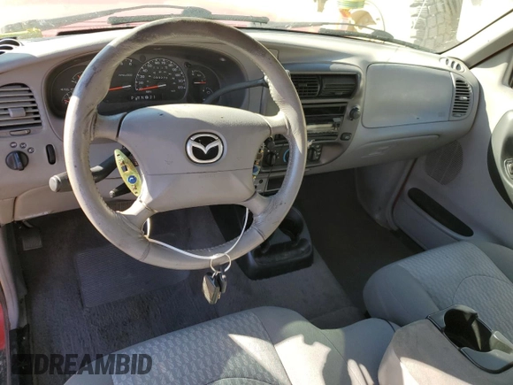 2001 Mazda B-Series Truck DS z VIN 4F4YR12U31TM27467, wystawiony jako Copart lot #73532224 z przebiegiem 89 270 mil mil oraz Szkoda całkowita • Salvage title. Historia ofert i sprzedaży dostępna na DreamBid. Obrazek 8.