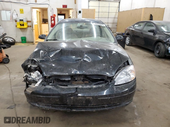 2003 Ford Taurus SEL Deluxe with VIN 1FAHP56S43A219925, listed as a Copart auction lot 76978824 with 191,000 mi miles and Salvage Title. Bid and sale history available at DreamBid. Image 5.