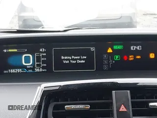 2019 Toyota Prius L Eco z VIN JTDKARFU8K3085918, wystawiony jako IAAI lot #41107891 z przebiegiem 166 295 mil mil oraz . Historia ofert i sprzedaży dostępna na DreamBid. Obrazek 7.