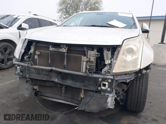 2012 Cadillac SRX Premium Collection с VIN 3GYFNCE33CS554561, выставлен на аукционе IAAI как лот 42081827 с пробегом 132 837 миль миль и . История ставок и продаж доступна на DreamBid. Изображение 6.