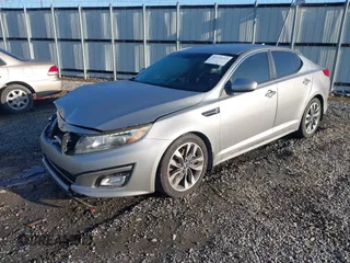 2015 Kia Optima SX z VIN 5XXGR4A72FG419739, wystawiony jako IAAI lot #41972453 z przebiegiem 204 336 mil mil oraz . Historia ofert i sprzedaży dostępna na DreamBid. Obrazek 2.