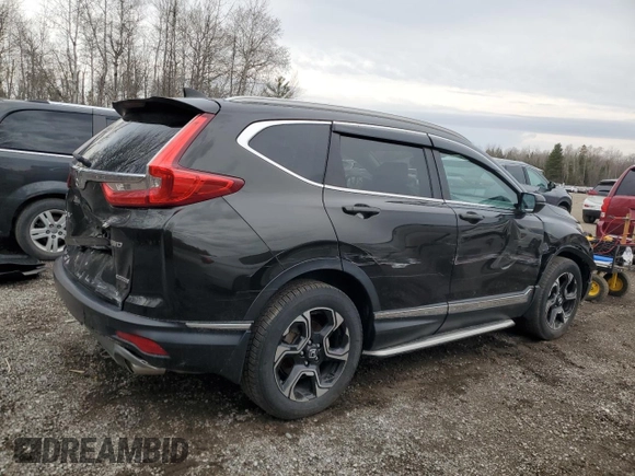 2017 Honda CR-V Touring with VIN 2HKRW2H9XHH113831, listed as a Copart auction lot 53442615 with 150,460 mi miles and Salvage Title. Bid and sale history available at DreamBid. Image 3.
