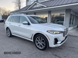 2020 BMW X7 xDrive40i with VIN 5UXCW2C05L9A03397, listed as a IAAI auction lot 41381437 with 141,656 mi miles. Bid and sale history available at carsss.com. Image 1.