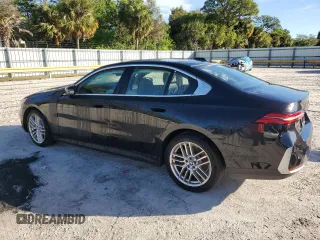 2024 BMW 5 Series 530i with VIN WBA43FJ09RCR17036, listed as a Copart auction lot 85694394 with 11,900 mi miles and Non Repairable. Bid and sale history available at carsss.com. Image 2.
