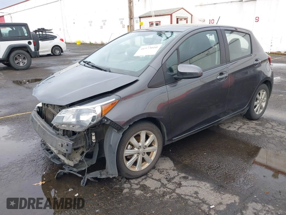 2015 Toyota Yaris L with VIN VNKKTUD38FA043393, listed as a IAAI auction lot 41573010 with 107,146 mi miles and . Bid and sale history available at DreamBid. Image 18.
