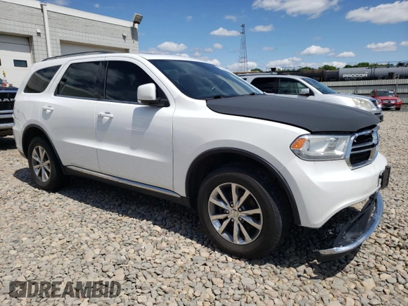 2014 Dodge Durango Limited with VIN 1C4RDJDG4EC563146, listed as a Copart auction lot 51373545 with 132,636 mi miles and Salvage title. Bid and sale history available at DreamBid. Image 4.