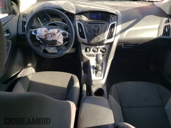 2014 Ford Focus SE with VIN 1FADP3F20EL340123, listed as a Copart auction lot 77626984 with 69,487 mi miles and Salvage Title. Bid and sale history available at DreamBid. Image 8.