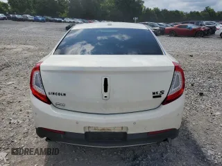 2013 Lincoln MKS with VIN 1LNHL9EK8DG605675, listed as a Copart auction lot 62448455 with 102,642 mi miles and Salvage title. Bid and sale history available at DreamBid. Image 6.