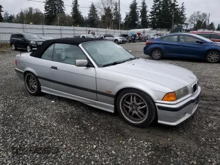 1999 BMW 3 Series 328ic with VIN WBABK7331XET68084, listed as a Copart auction lot 86205884 with 0 mi miles and Salvage Title. Bid and sale history available at carsss.com. Image 4.