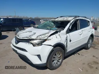 2016 Toyota RAV4 LE with VIN 2T3ZFREV2GW291072, listed as a IAAI auction lot 41831444 with 135,820 mi miles. Bid and sale history available at carsss.com. Image 6.