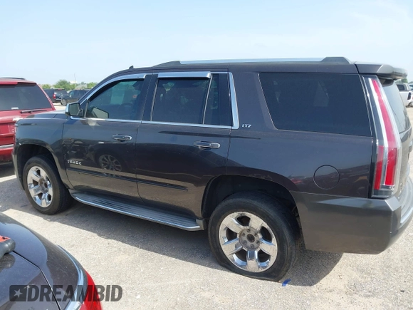 2015 Chevrolet Tahoe LTZ with VIN 1GNSCCKC2FR170090, listed as a IAAI auction lot 42616452 with 249,940 mi miles and . Bid and sale history available at DreamBid. Image 14.