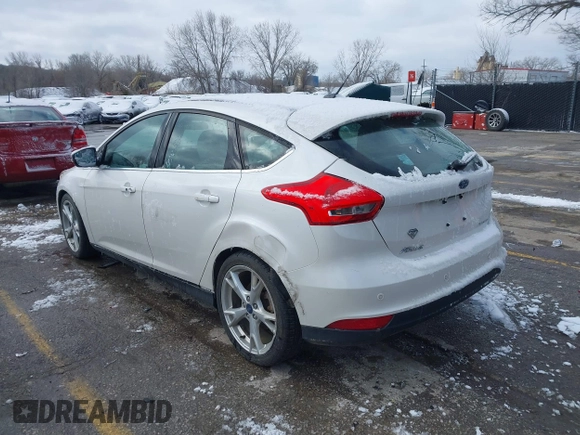 2015 Ford Focus Titanium с VIN 1FADP3N26FL232639, выставлен на аукционе IAAI как лот 41699403 с пробегом 86 870 миль миль и . История ставок и продаж доступна на DreamBid. Изображение 3.