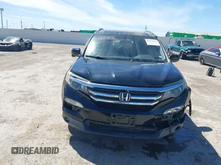 2016 Honda Pilot EX-L with VIN 5FNYF6H58GB018830, listed as a IAAI auction lot 41814636 with 147,242 mi miles. Bid and sale history available at carsss.com. Image 12.