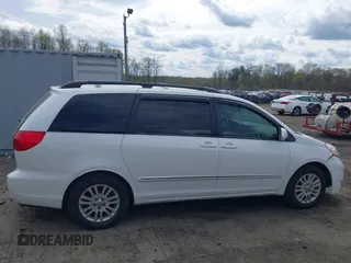 2009 Toyota Sienna XLE with VIN 5TDZK22C79S259793, listed as a IAAI auction lot 41905617 with 185,121 mi miles and . Bid and sale history available at DreamBid. Image 14.
