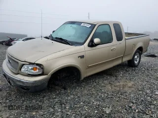 1999 Ford F-150 XL with VIN 1FTRX18L7XNB64656, listed as a Copart auction lot 84610454 with 0 mi miles and Salvage Title. Bid and sale history available at carsss.com. Image 1.