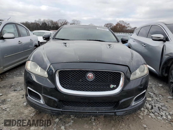 2014 Jaguar XJ with VIN SAJWA2EKXEMV64494, listed as a Copart auction lot 82634004 with 119,811 mi miles and Clean title. Bid and sale history available at DreamBid. Image 5.