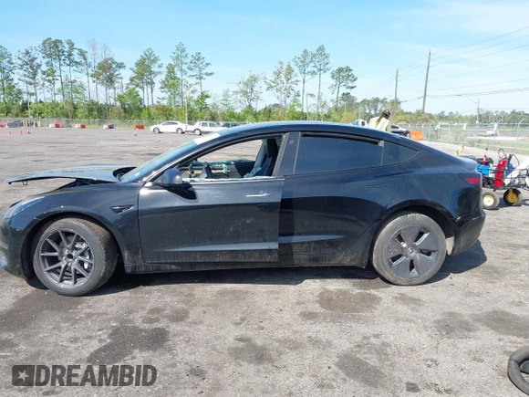 2023 Tesla Model 3 with VIN 5YJ3E1EA3PF681515, listed as a IAAI auction lot 41899053 with 15,985 mi miles and . Bid and sale history available at carsss.com. Image 14.