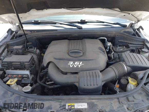 2013 Dodge Durango SXT with VIN 1C4RDHAG0DC669587, listed as a IAAI auction lot 42599143 with 126,748 mi miles and . Bid and sale history available at DreamBid. Image 10.