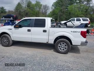 2011 Ford F-150 XL with VIN 1FTFW1EF0BKD38842, listed as a IAAI auction lot 42120431 with 285,712 mi miles and . Bid and sale history available at carsss.com. Image 14.