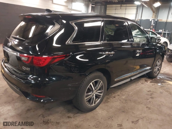 2019 Infiniti QX60 PURE with VIN 5N1DL0MM6KC519962, listed as a IAAI auction lot 41928195 with 89,900 mi miles. Bid and sale history available at carsss.com. Image 4.