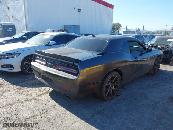 2019 Dodge Challenger R/T Scat Pack with VIN 2C3CDZFJXKH723881, listed as a IAAI auction lot 41348860 with 67,472 mi miles. Bid and sale history available at carsss.com. Image 4.