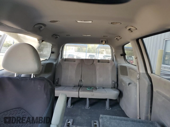 2012 Kia Sedona LX with VIN KNDMG4C71C6492455, listed as a Copart auction lot 63077744 with 210,306 mi miles and Salvage Title. Bid and sale history available at carsss.com. Image 10.