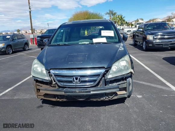 2005 Honda Odyssey EX-L with VIN 5FNRL38735B057514, listed as a IAAI auction lot 41762185 with 264,851 mi miles. Bid and sale history available at carsss.com. Image 6.